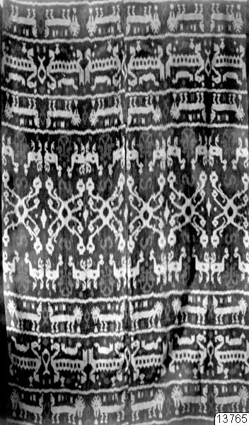 Warp ikat hinggi with rows of horses, deer, birds and ancestor figures
